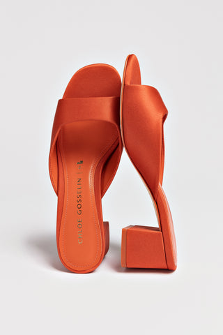 Chloe Gosselin by Larroudé Anah Mule In Orange Sunrise Satin