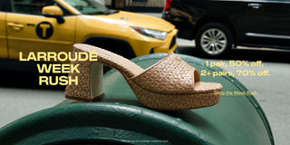 Larroudé Week Rush hero banner featuring a woven raffia platform sandal against a New York City street scene, with text promoting 50% off one pair and 70% off two or more pairs.
