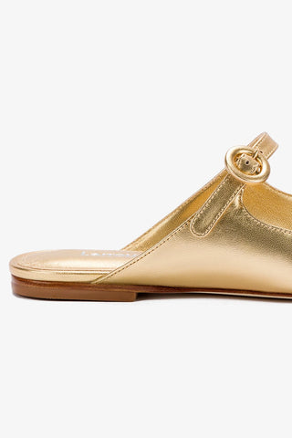 Blair Flat Mule In Gold Metallic Leather