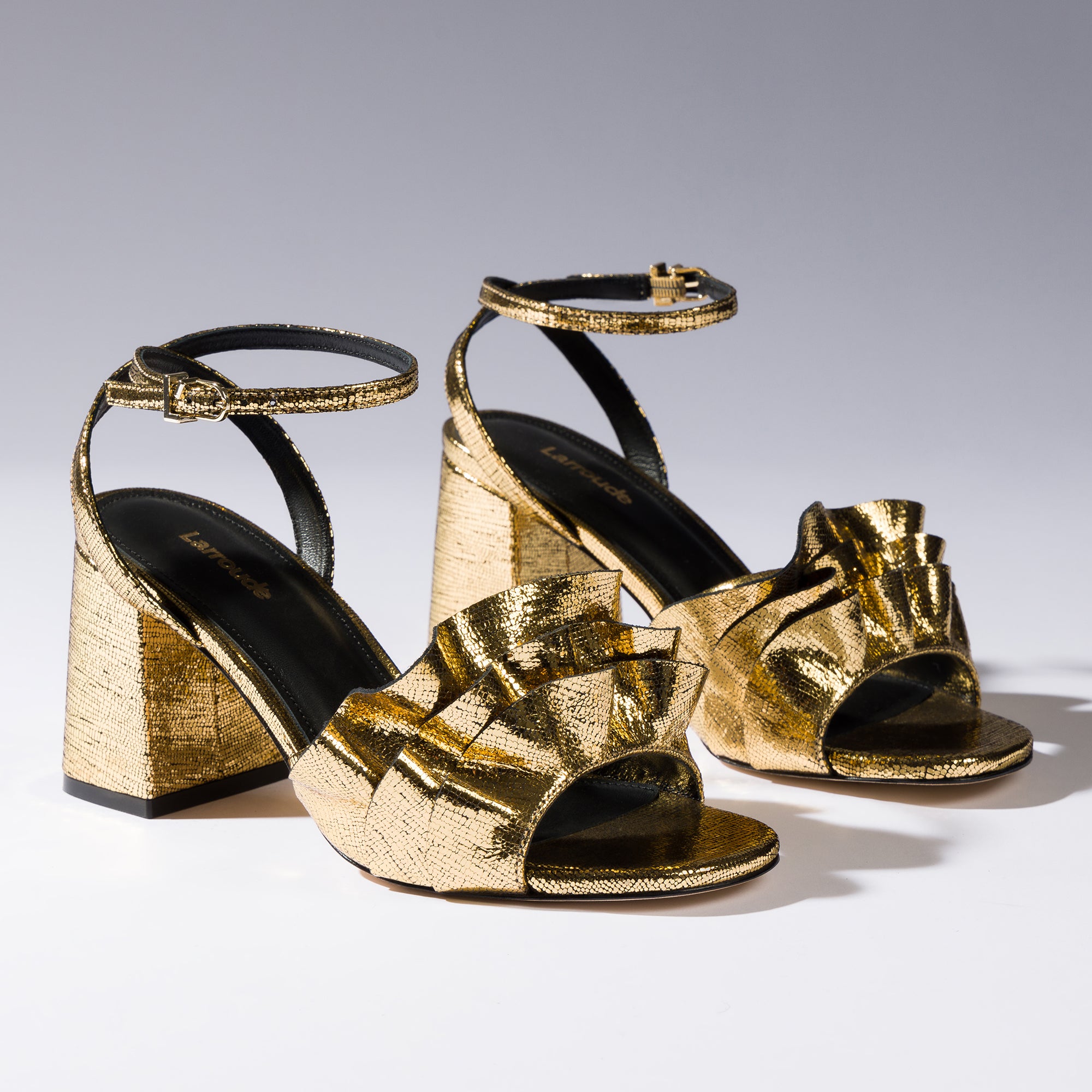 Selena Ruffle Sandal In Gold Cracked Metallic Leather