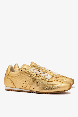 Stella Sneaker In Gold Metallic Leather