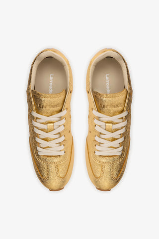 Stella Sneaker In Gold Metallic Leather