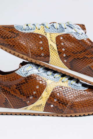 Stella Sneaker Oud Python Leather Sneaker Larroudé
