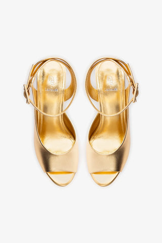 Deena By Larroudé Wedge Sandal In Gold Metallic Leather