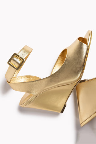 Deena By Larroudé Wedge Sandal In Gold Metallic Leather