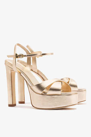 Bianca High Platform Sandal In Platina Metallic Leather
